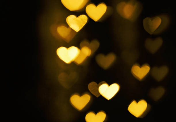 istock Golden heart bokeh background 1187892056