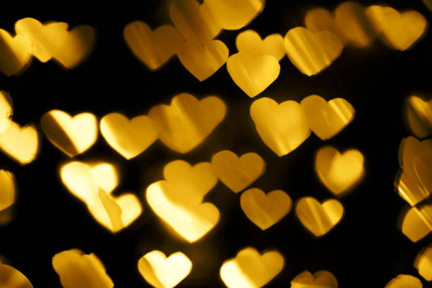 istock Golden heart bokeh background 1187892080