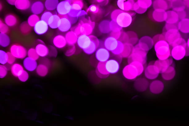 istock Colorful circles bokeh festive glitter dark background 1187892725