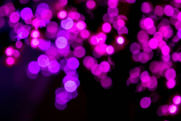 istock Colorful circles bokeh festive glitter dark background 1187892745