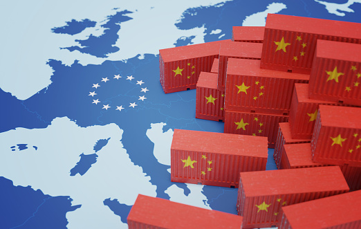 Chinese cargo containers on map of Europe. Import of chenese goods concept. 3D rendered illustration.