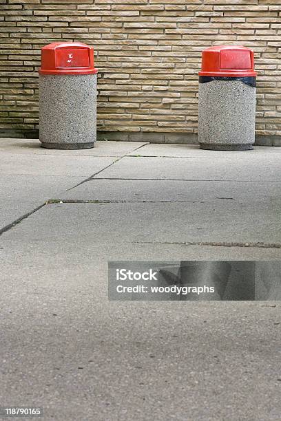 Two Garbage Cans Against Stone Wall Stock Photo - Download Image Now - Color Image, Container, Courtyard