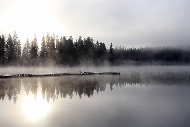 istock A cool, foggy fall morning sunrise reflection 1187906760