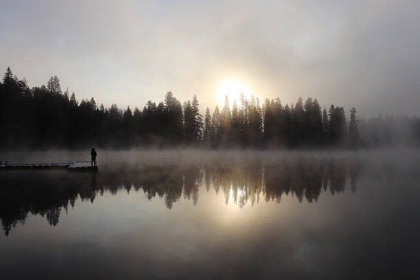 istock A cool, foggy fall morning sunrise reflection 1187906779