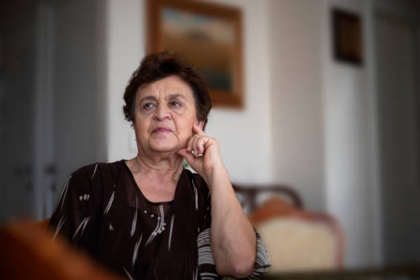istock Mature woman resting at home and thinking 1187906846