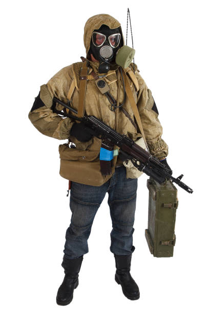 istock Stalker in gas mask with weapon 1187916173
