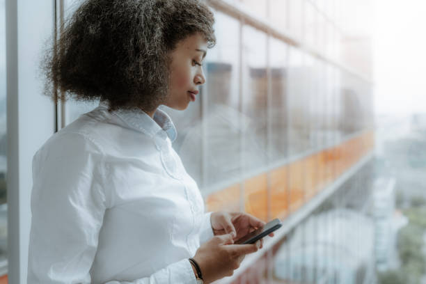 istock Mixed woman entrepreneur near window 1187916193