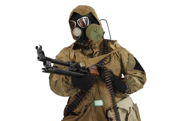 istock Stalker in gas mask with weapon 1187916202