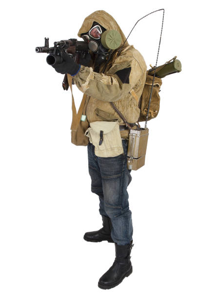 istock Stalker in gas mask with weapon 1187916249