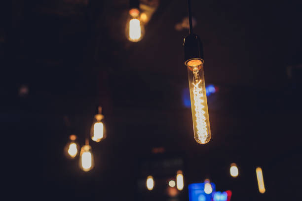 istock Lighting decor. Retro light bulb filament close up.Illuminated. 1187917277