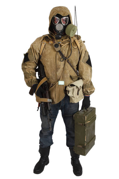 istock Stalker in gas mask with weapon 1187917379
