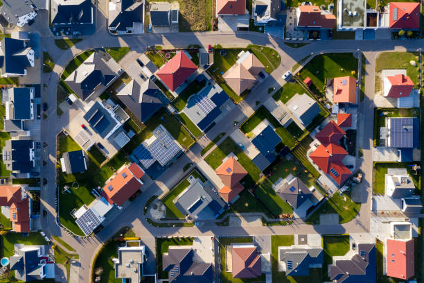 New Housing Estate from Above Aerial view of a modern houses in a new housing development. renewable energy photos stock pictures, royalty-free photos & images