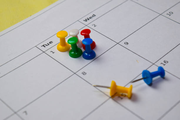 istock Close up Pinboard on white calendar. Schedule, reminder concept 1187920330