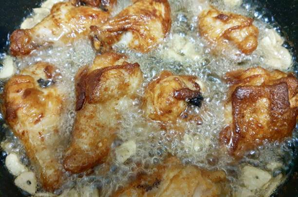 istock Delicious Deep Frying Chicken in A Pan 1187931657