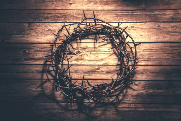 istock Crown of thorns  on wood background 1187934007