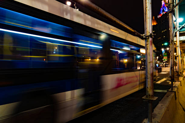 istock NYC Bus Moving at Night 1187948263
