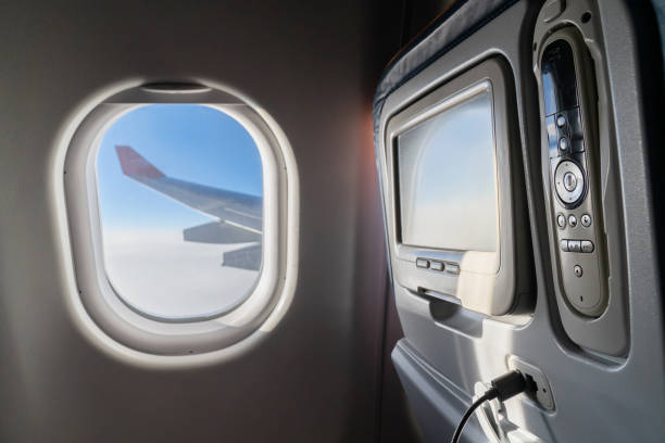 istock Airplane window view on the flight while traveling around the world 1187952147
