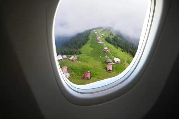 Airplane window and Pokut Highland in Rize Province, Blacksea part of Turkey.