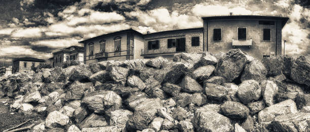 istock Panoramic view of beautiful beach with rocks and homes 1187957576
