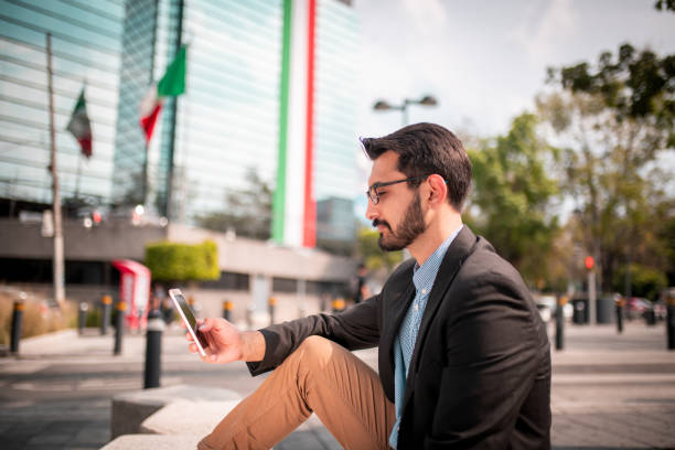 istock Young businessman using the phone 1187964534