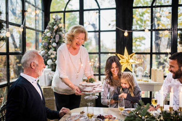istock Family Enjoying Christmas Dinner 1187967453