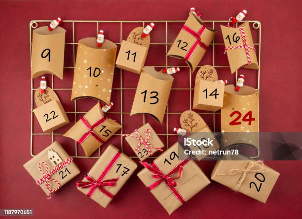 Advent Calendar With Craft Carton Boxes On The Mesh Board Stock Photo - Download Image Now