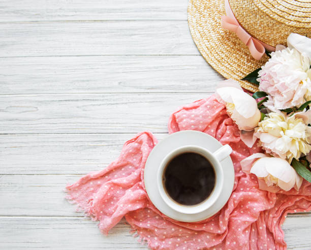 istock Cup of tea and peonies 1187970739