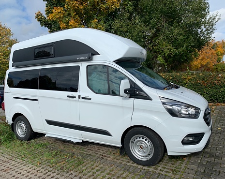 Bietigheim-Bissingen, Germany - October, 16 - 2019:  RV vehicle, Ford Nugget alcove, on public parking place.