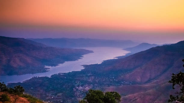 istock Beautiful Sunrise over the river and mountains 1187974171