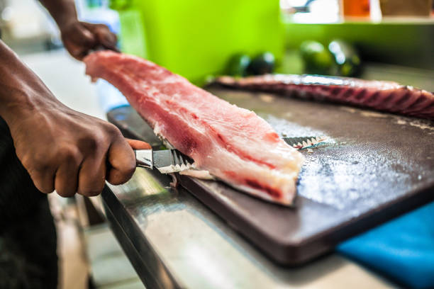 Chef preparing fish or seafood meal