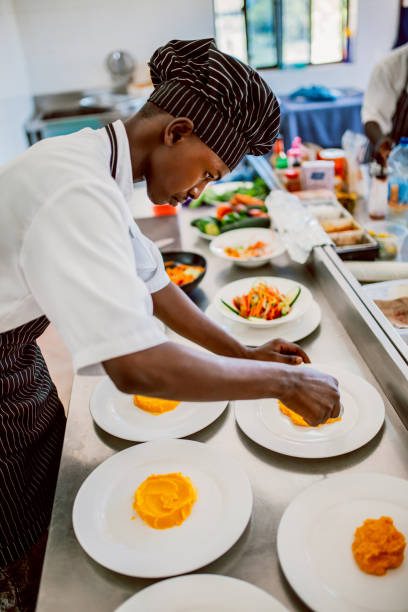 istock Chef preparing fish or seafood meal 1187976561