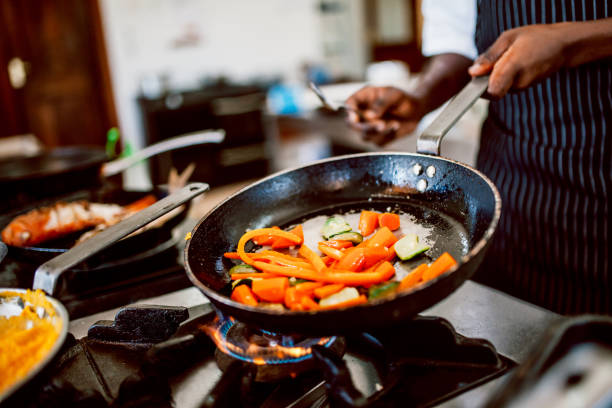 istock Chef preparing fish or seafood meal 1187976626
