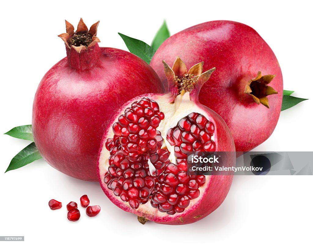 Opened pomegranate with seeds isolated on white background Pomegranate on a white background Pomegranate Stock Photo