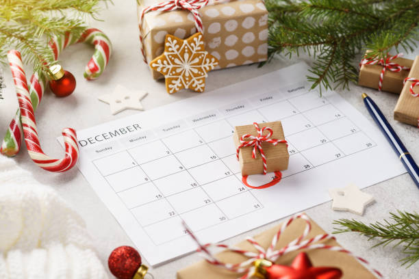 istock Planner page with Christmas gift box lying on 25th of December. 1187978186