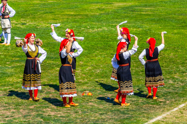 National Festival Dervishi Varvara 2019, Bulgaria Varvara, Bulgaria- March 24, 2019: Female Bulgarian folk dancers in national costumes at the National Festival Dervishi Varvara 2019, village of Varvara, Pazardzhik Province, Rhodope Mountains bulgarian culture stock pictures, royalty-free photos & images