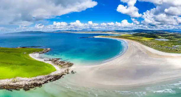 Aerial view of the awarded Narin Beach by Portnoo and Inishkeel Island in County Donegal, Ireland.