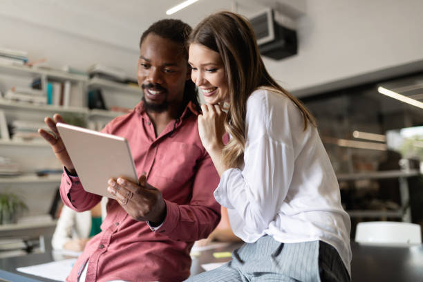 istock Group of business people collaborating on project in office 1187987670