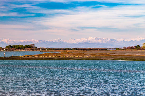 istock Spring sunset in the lagoon of Grado 1187987754