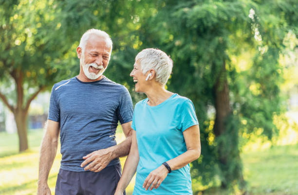 istock Senior couple relax after jogging 1187990620