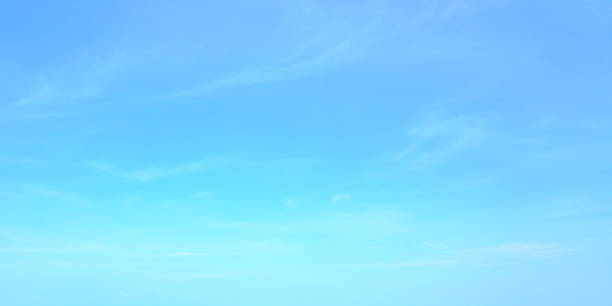 istock blue sky with cloud background sky bright color 1187990927