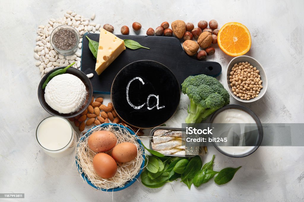 Foods High in Calcium Foods High in Calcium for bone health, muscle constraction, lower cancer risks, weight loss. Top view Dairy Product Stock Photo