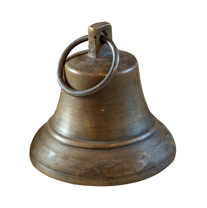 Ancient bell isolated  on a white background close-up.Ancient bell  top front view