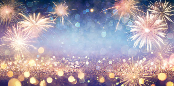istock Abstract Golden Glitter Background With Fireworks 1187995978