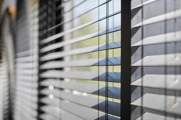 istock Office blinds. Modern wooden jalousie. Office meeting room lighting range control. 1187996146