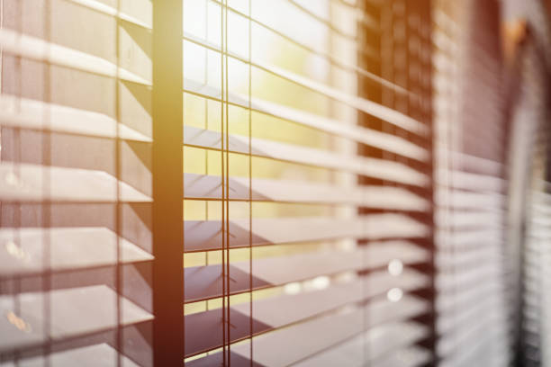 istock Office blinds. Modern wooden jalousie. Office meeting room lighting range control. 1187996196
