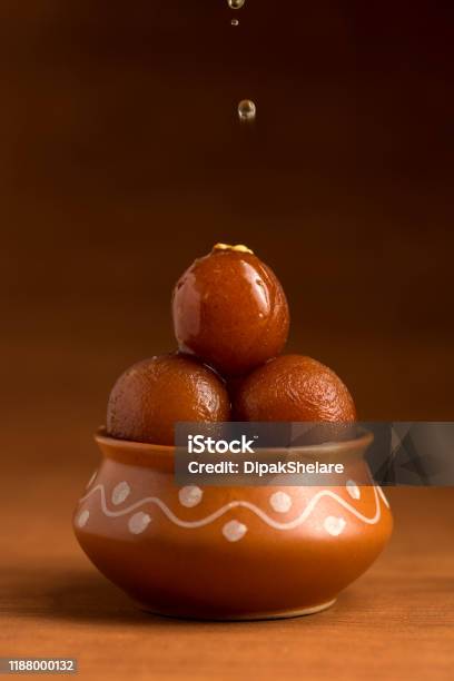 Gulab Jamun In Clay Pot Indian Dessert Or Sweet Dish Stock Photo - Download Image Now