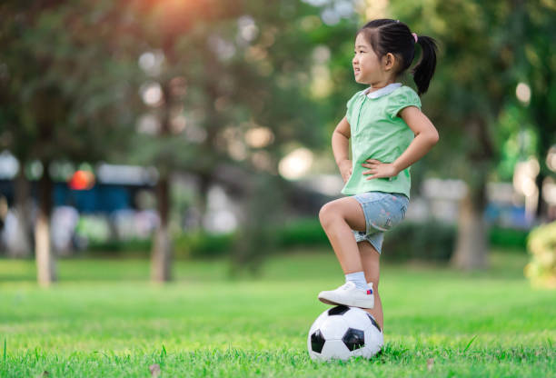 Soccer Girl Soccer Girl 4 year old girl stock pictures, royalty-free photos & images