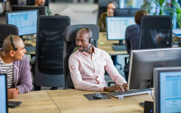 istock African-American Man Talking To A Customer Over A Headset 1188002041