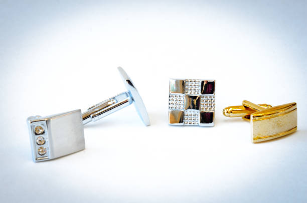 istock Studio shot group of modern stainless steel cufflinks isolated on white 1188002123