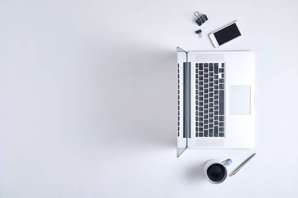 istock Office desktop with laptop and accessories, top view 1188002721